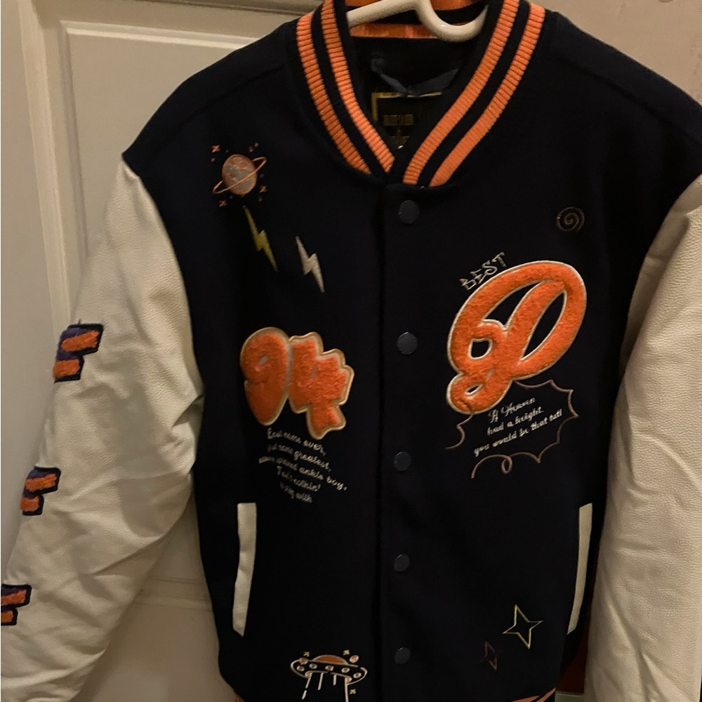 “Stay Positive” Varsity jacket.